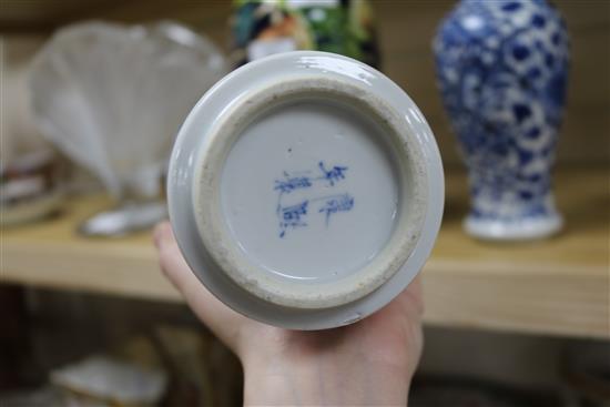 A pair of Chinese blue and white vases 23cm.